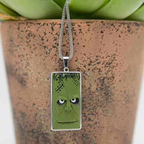 green frankenstein necklace in stainless steel cabochon with funny illustration like expression
